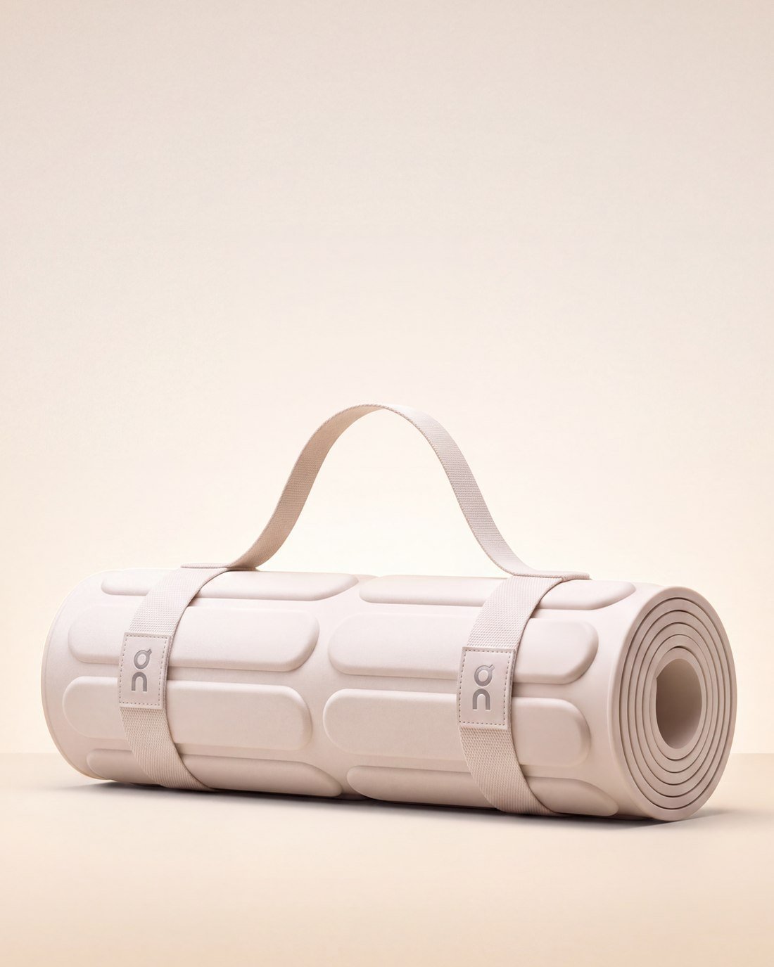 On x Yoga performance mat, rolled